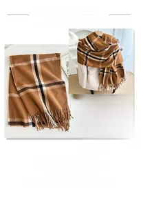 Detailed view of British style brown plaid scarf with soft fringe edges and thick texture