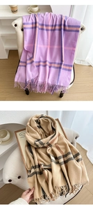 Close-up of British style checkered scarves with fringe tassels in purple and khaki