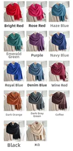 Detailed palette of solid color scarves with tassels in 14 various winter shades