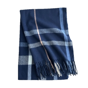 Thick plaid winter scarf for women in navy blue and beige with elegant fringe detail
