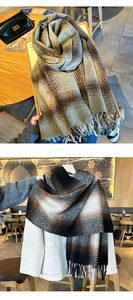 Macro detail of thick gradient plaid scarf with soft tassels in warm coffee tones