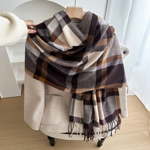 Thick checkered scarf with brown tassels and plaid pattern for winter warmth