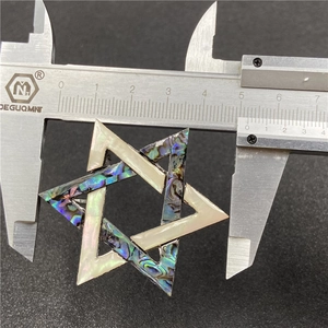 Abalone and white shell hexagram star pendant measured with a digital caliper