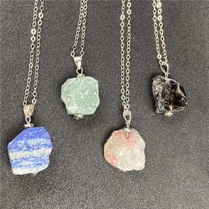Irregular raw gemstone necklaces featuring amethyst and quartz on silver chain