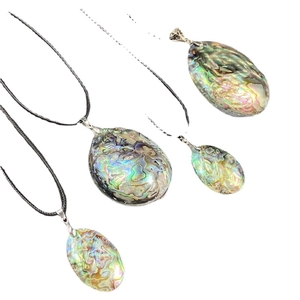 Oval abalone shell pendants set with colorful natural patterns on black wax cords