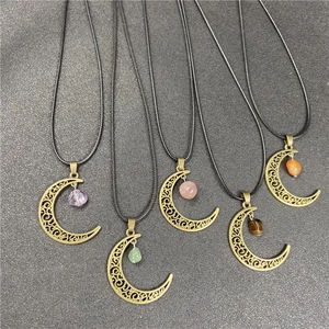 Set of five moon-shaped bronze necklaces with colorful semi-precious stone beads