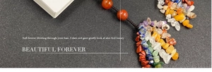 Macro shot of colorful natural crystal stone beads with handmade woven brown rope detail