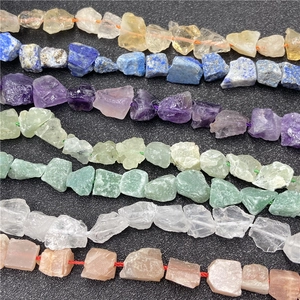 Detailed view of colorful irregular natural gemstone chip beads for DIY jewelry making