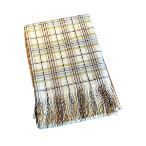 Plaid tassel scarf for women featuring a minimalist cream and blue checkered pattern