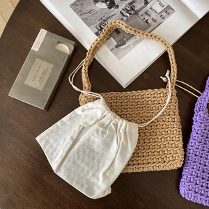 Handmade woven cotton rope shoulder bag with drawstring inner pouch and boho style