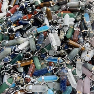 Assorted natural hexagonal crystal point pendants in quartz and agate with metal bails
