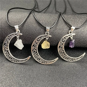 Amethyst and citrine moon pendants with raw stones on black cord necklaces