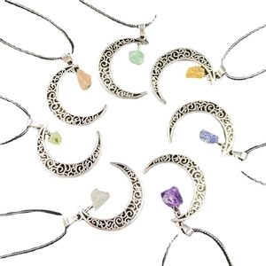 Set of seven vintage hollow moon necklaces with assorted natural gemstone raw stone pendants