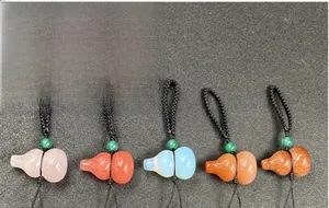 Detailed close-up of five gourd-shaped gemstone pendants with black braided cords