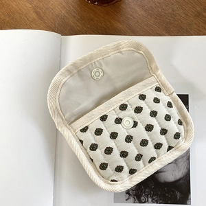 Floral quilted mini wallet with vintage green leaf pattern and snap closure