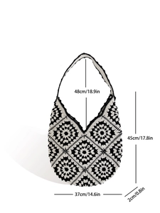 Handmade crochet granny square tote bag in black and white with size measurements