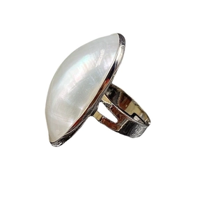 French style mabe pearl ring featuring a large oval shell on an open silver band