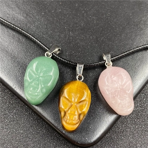 Skull gemstone pendants in aventurine tiger eye and rose quartz on black cords