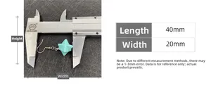 Detail view of turquoise Merkaba star earring being measured with a digital caliper