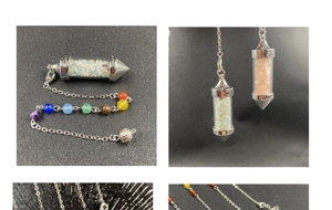 Detailed macro view of crystal dowsing pendulum with colorful chakra beads and Love engraving