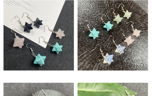 Detail of Merkaba star stone earrings in various crystal colors with silver hooks