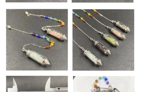 Macro shot of colorful natural crystal stone pendants with chakra bead chains and calipers