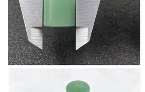 Macro view of measuring light green natural stone cylinder beads with a vernier caliper