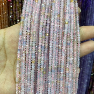 Macro detail of faceted Amazonite abacus beads in mixed pastel colors for jewelry making