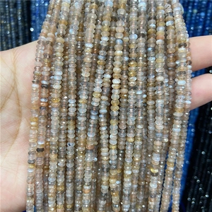 Macro detail of faceted Amazonite abacus beads with natural flashes for jewelry making