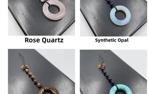 Detail of four stone pendant charms featuring rose quartz and tiger eye平安扣 styles