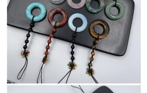 Detailed assortment of natural stone bag charms with rose quartz and tiger eye pendants