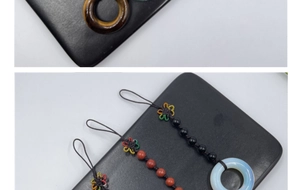 Detailed view of hand-woven tiger eye and agate stone keychain with Chinese knot