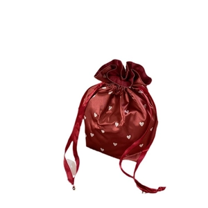 Portable burgundy satin drawstring storage bag with white heart patterns and silk ties