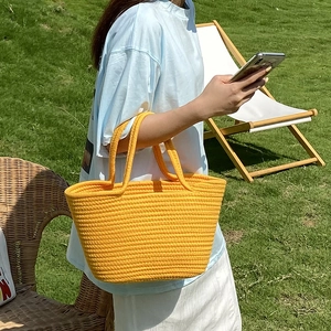 Handmade bright yellow woven cotton rope handbag for summer beach outings and vacations