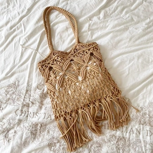 Handmade bohemian beige woven tote bag with fringe tassels and drawstring liner bag