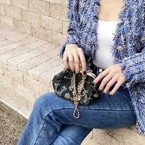 Vintage black kiss-lock frame bag with gold floral embroidery and beaded metal chain strap
