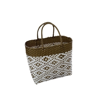 Handwoven large capacity tote bag in green and white contrast for beach vacation use
