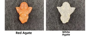 Detailed comparison of hand-carved angel pendants in natural red and white agate stones