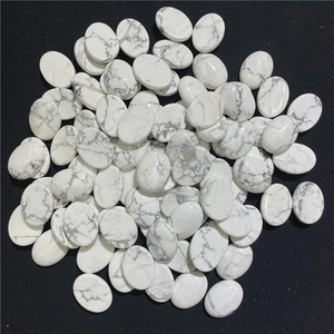 Pietre ovali in howlite bianca con venature marmoree grigie per gioielli fai da te