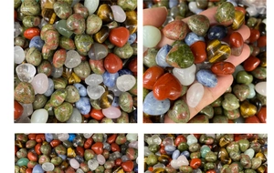 Detailed close-up of polished heart-shaped natural gemstones in various mineral colors