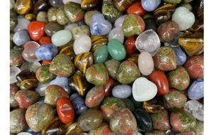 Macro shot of assorted heart-shaped polished natural crystal stones and gemstones