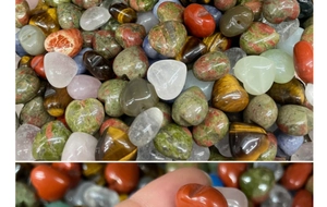 Close-up of heart-shaped natural gemstone beads for DIY jewelry making and crafts