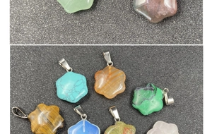 Macro view of polished star-shaped stone pendants in various crystals and natural textures
