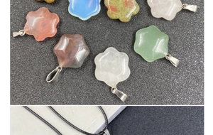Close-up of hexagonal flower pendants in colorful natural stones with black woven cords
