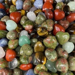 Polished heart-shaped natural semi-precious gemstones in assorted colorful mineral mix