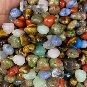 Polished heart-shaped natural gemstones in various quartz and crystal varieties
