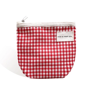 Portable red and white checkered canvas pouch with zipper and 'nice to meet you' label