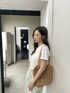 Handmade hollow woven cotton thread shoulder bag with vintage mesh design for beach vacation