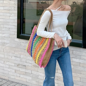 Handmade large straw tote bag with colorful vertical stripes for summer beach vacation
