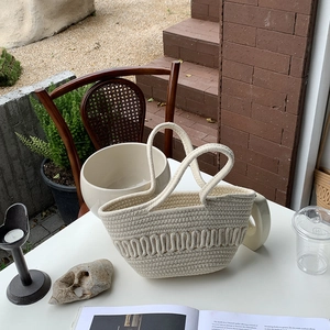 Creamy cotton rope woven handbag with unique wavy texture for beach holiday style